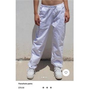 Subdued white parachute pants